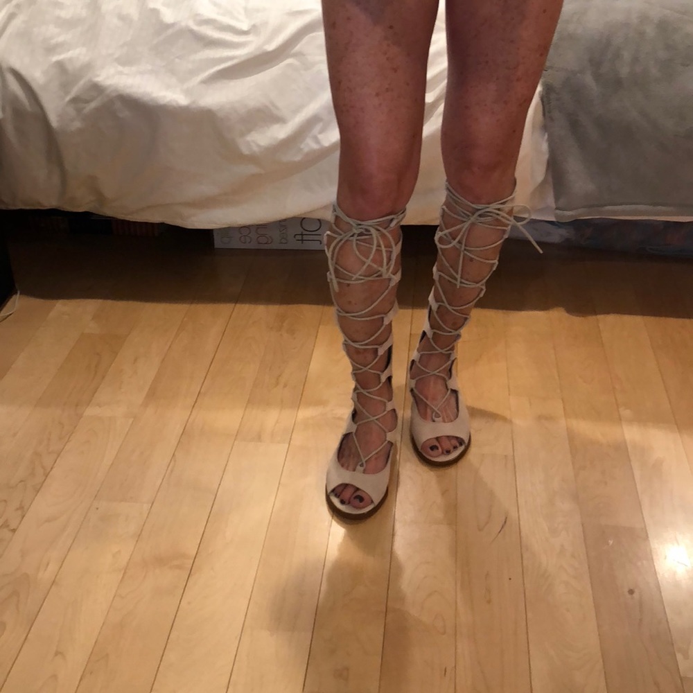 Knee high sandals by Marabelle